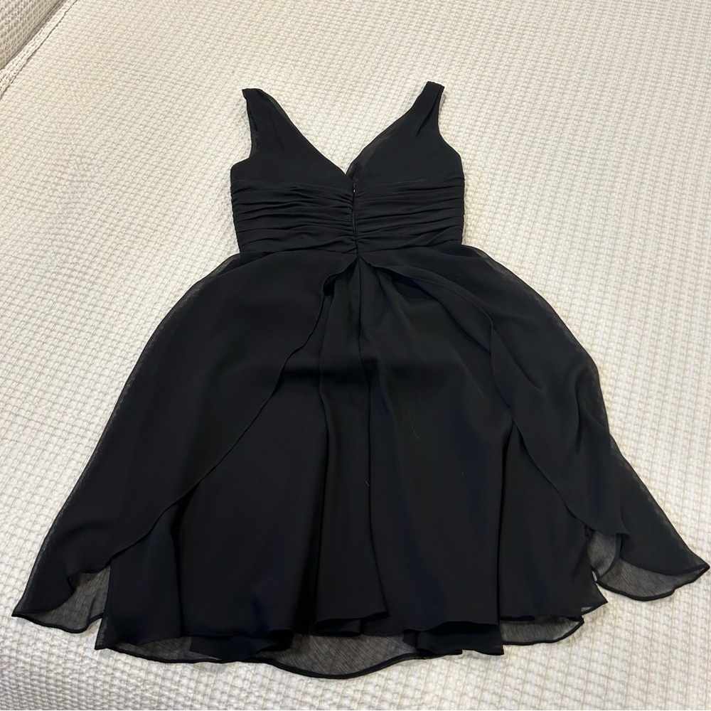 Beautiful Little Black Dress With Flattering Neckline
